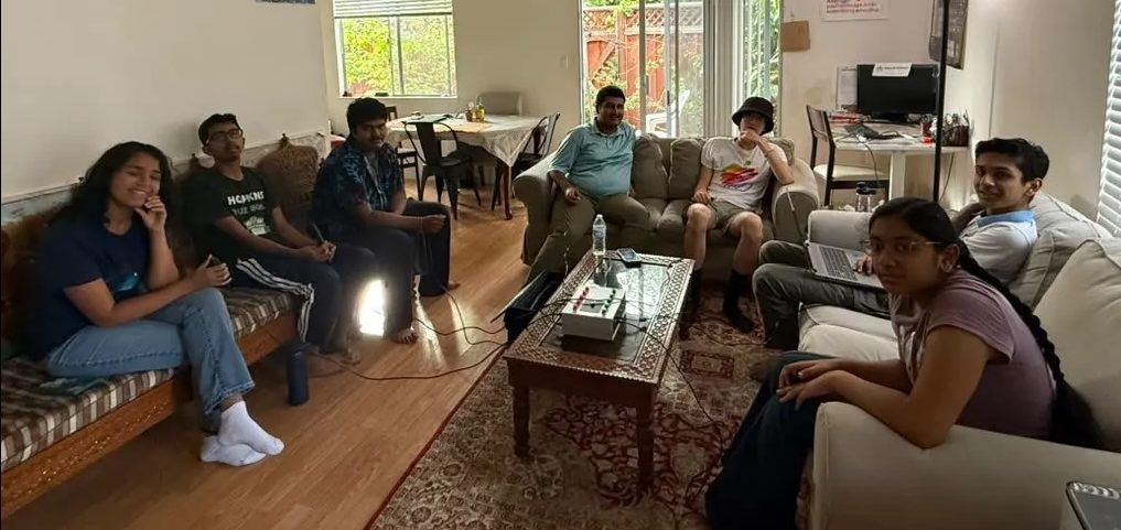 Team members studying together at a practice session
